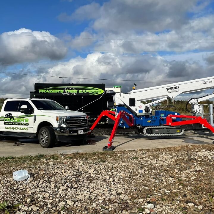 Image of Frazier's Tree Experts truck and bucket crane